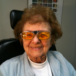 A woman wearing prescription sunglasses